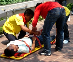 lifeguards with spinal-board